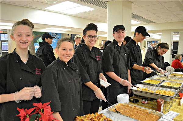 FCS students serve the meal they prepared for the breakfast. 